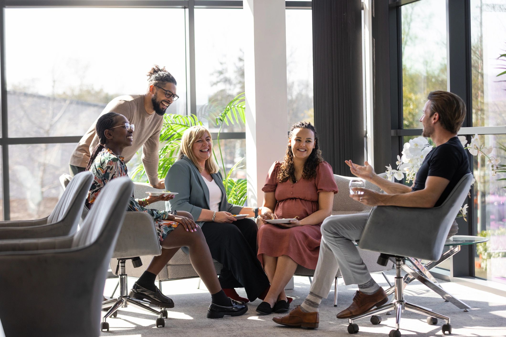 Consulting team collaborating in a modern office